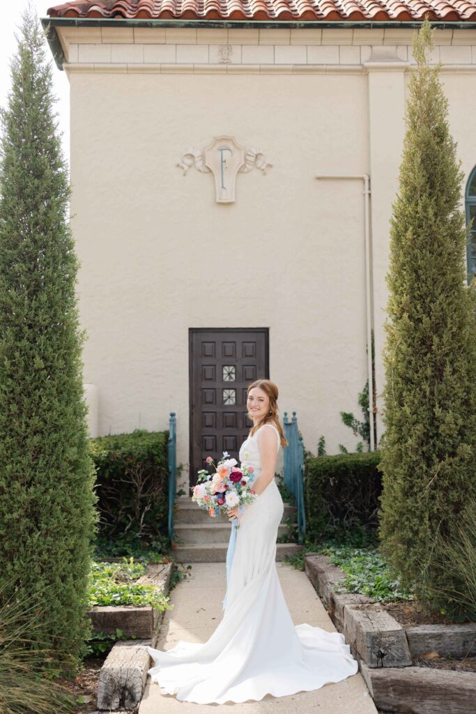 Beautiful bride in the courtyard of La Villa in the Kansas City Metro captured by a Kansas City Photographer.