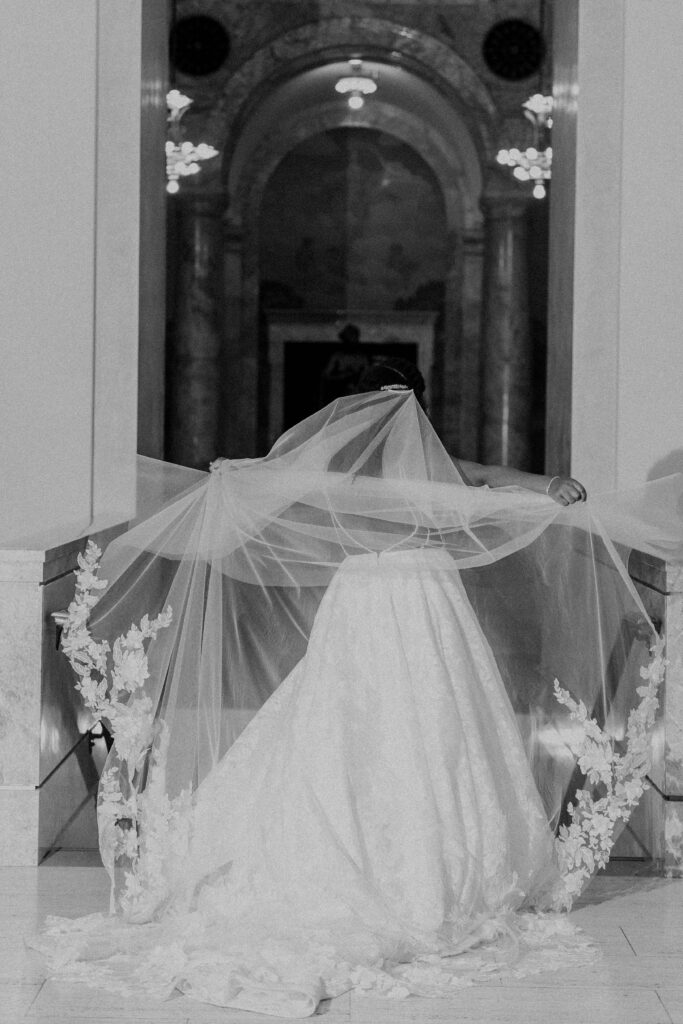 Bride showing off her cathedral veil. 