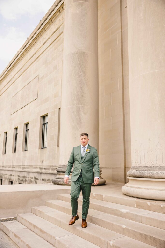 Groom standing on the steps of his Kansas City MO Wedding Venue.