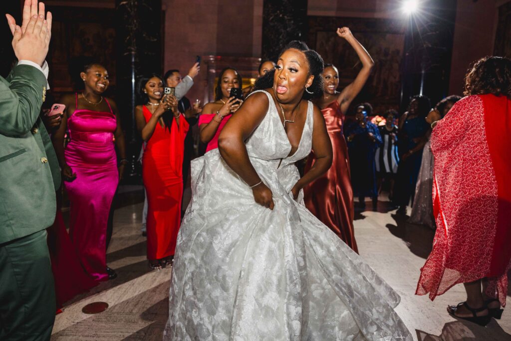 Bride breaking it down on the dance floor. 