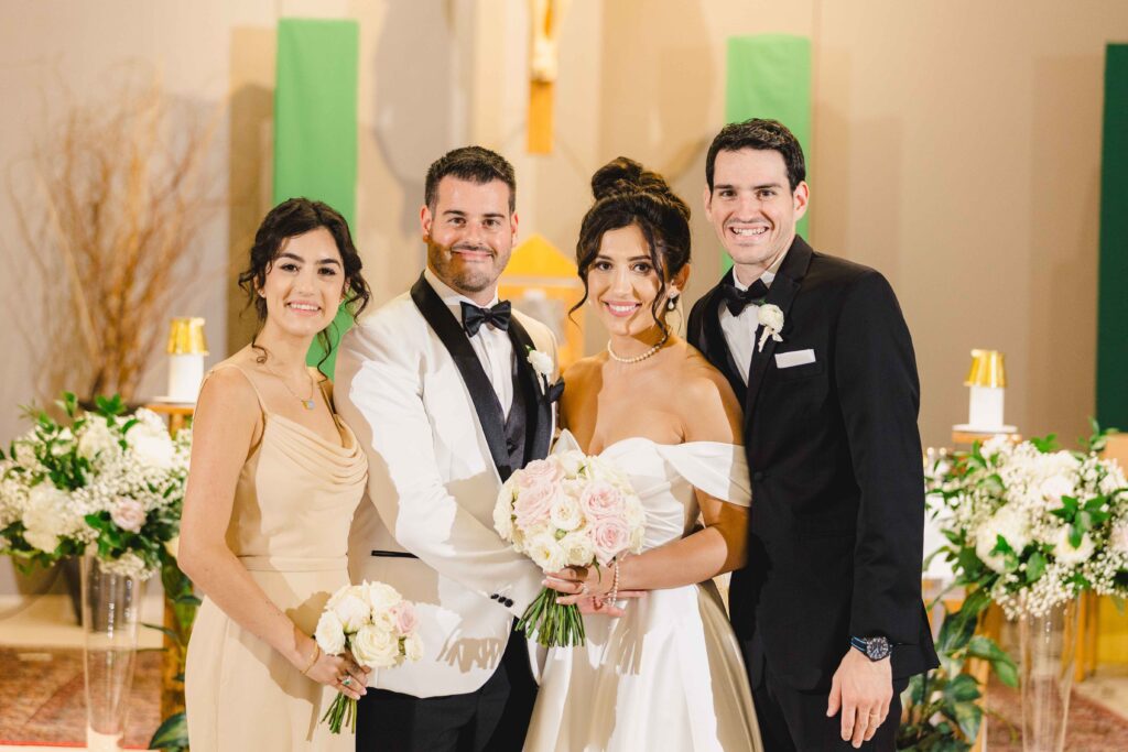 Bride and groom in family portraits planned from their wedding family photos list.