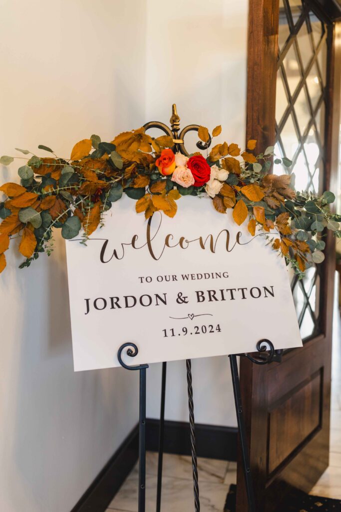 A welcome sign to Jordon and Britton's Oakwood Country Club wedding.