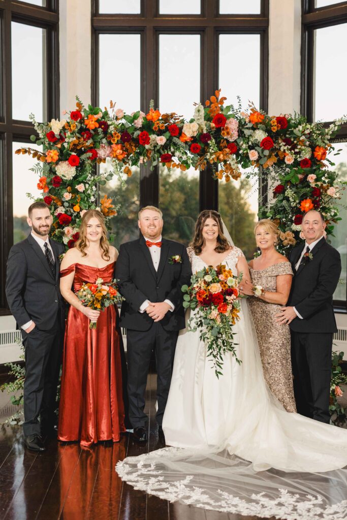 Bride and groom with the bride's family. 