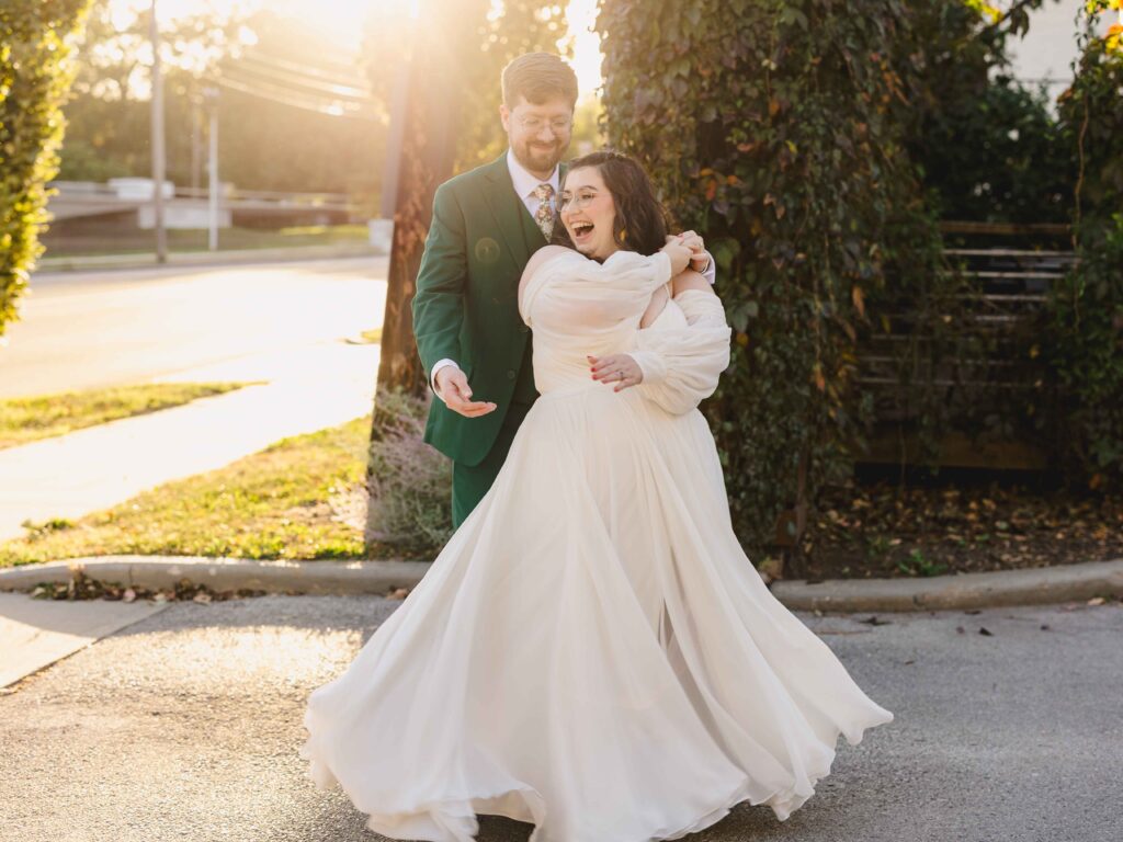 Groom spinning his wife at The Magnolia Brookside.