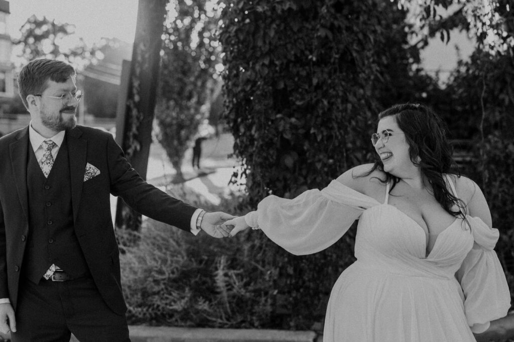 Newlyweds looking into each others eyes and smiling at The Magnolia Brookside.