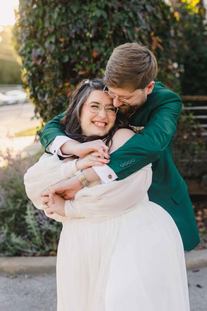 Bride and groom hugging at The Magnolia Brookside.