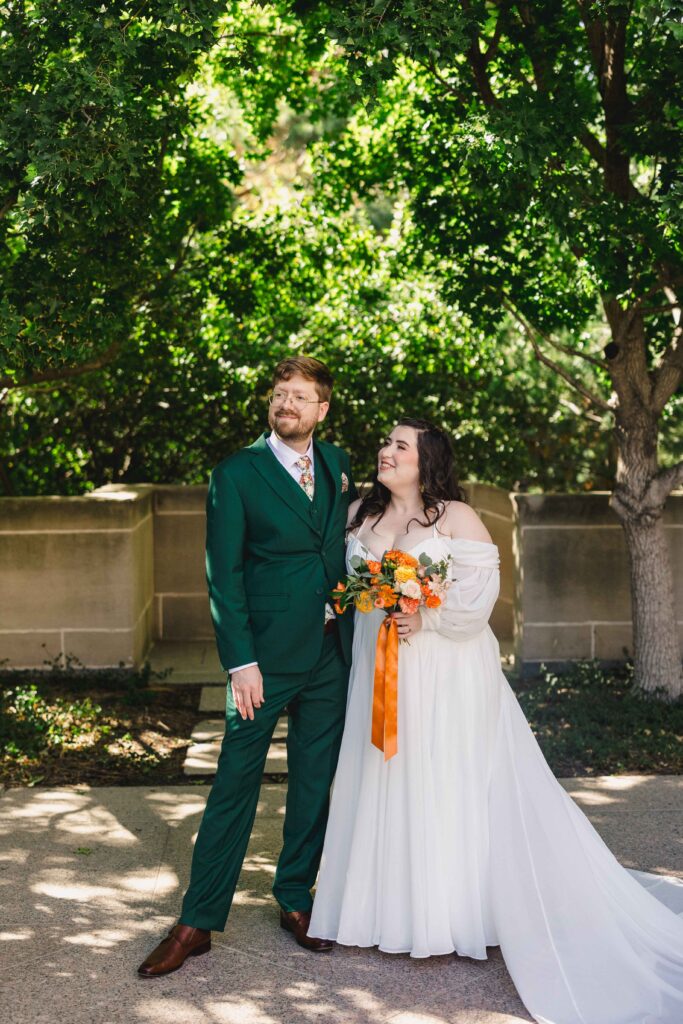 Bride and groom looking off into the distance. 