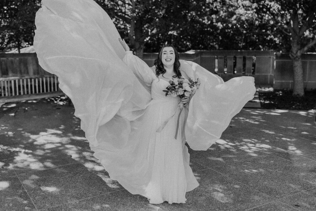 Bride throwing her dress up in the air. 