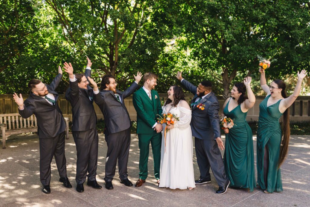 The bridal party cheering at the Nelson.