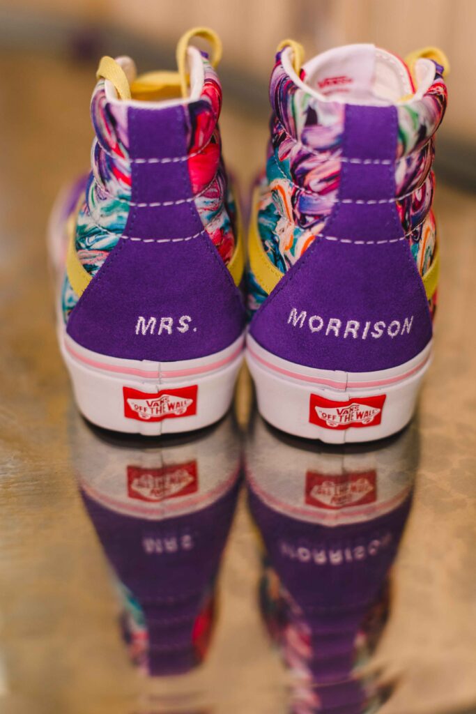 Custom purple Hufflepuff vans for the bride.