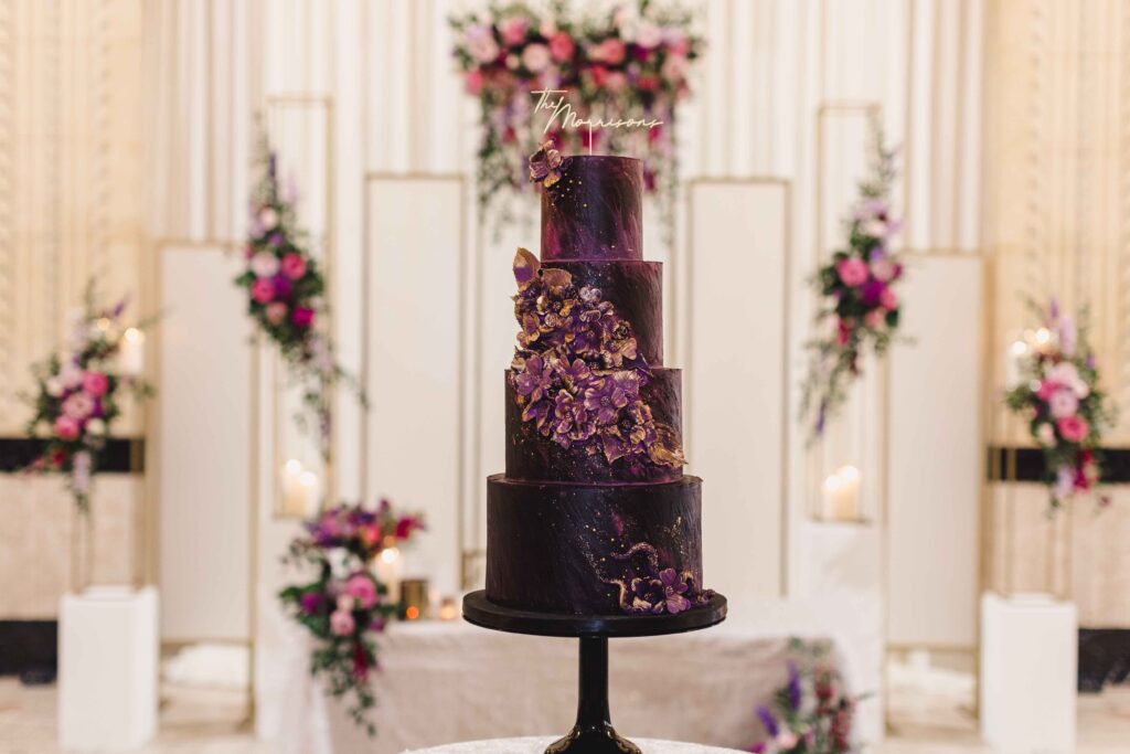 A beautiful purple wedding cake at The Grand Hall at Power & Light.