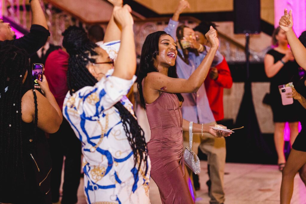 Guests having a good time and dancing at the reception at The Grand Hall at Power & Light.