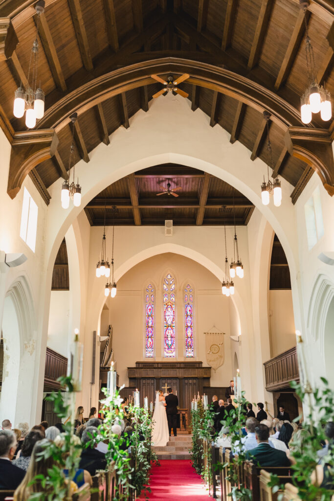 Bride and groom at the altar.