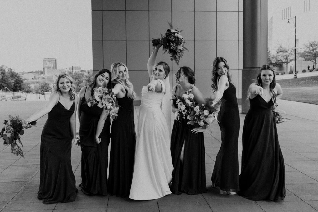 Bridal party posing silly.
