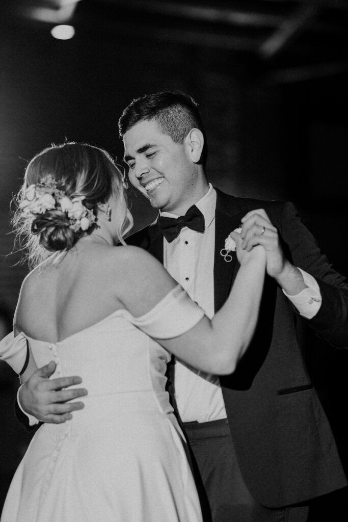 Bride and groom slow dancing at their reception at The Guild KC.
