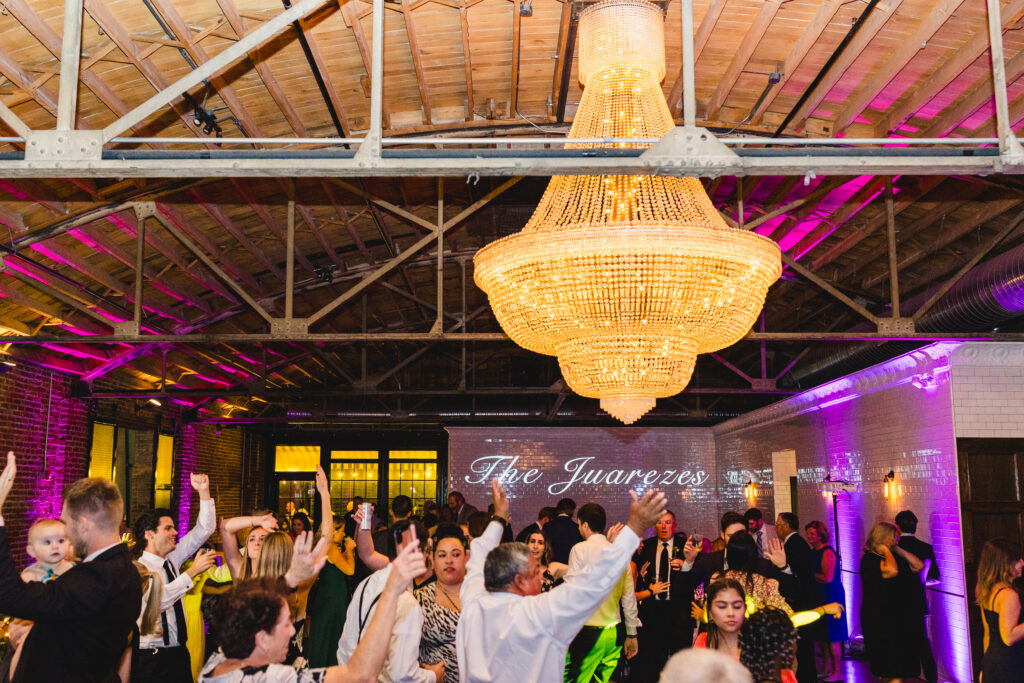 Guests dancing and enjoying the reception at The Guild KC.