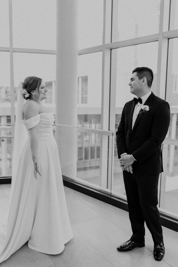 Groom seeing his bride for the first time.