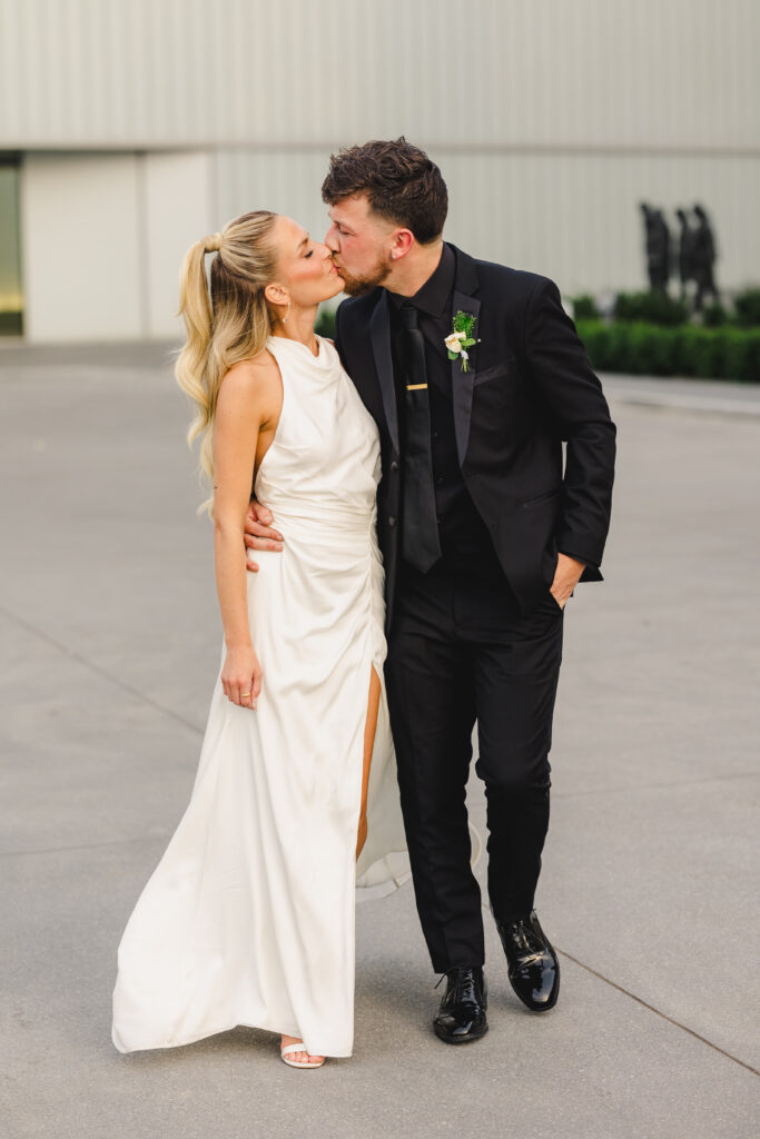 bride and groom kissing