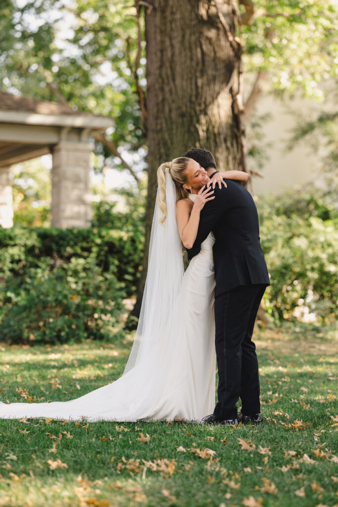 bride and groom first look photos
