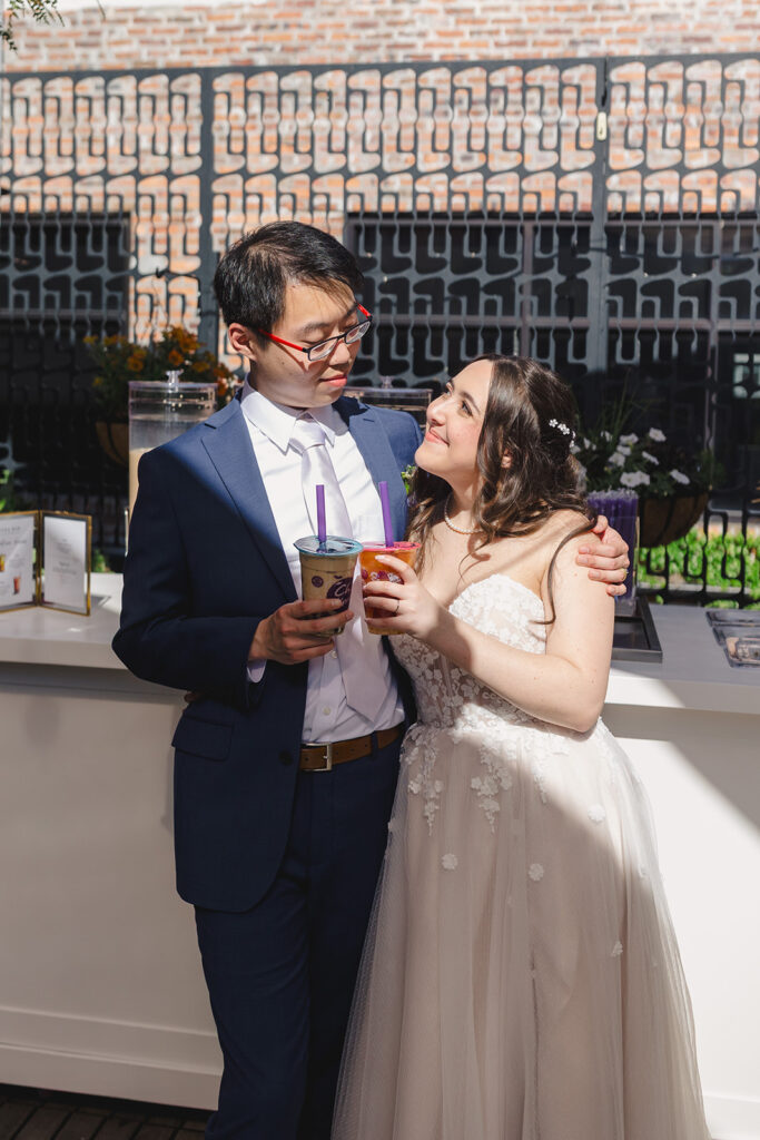 bride and groom with boba tea