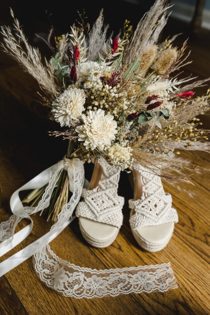 bridal accessories and dried floral bouquet