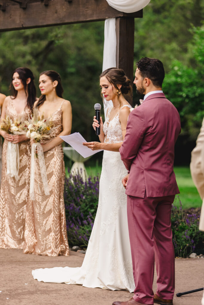 wedding vows shared during outdoor ceremony
