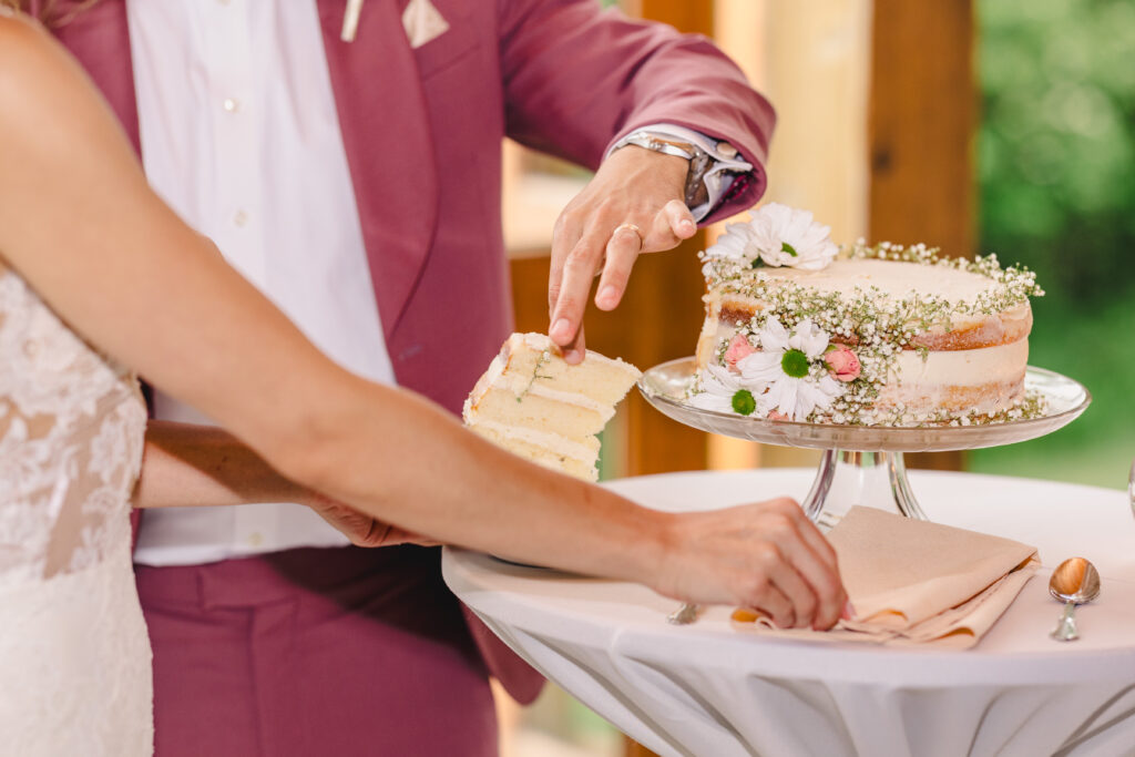 cutting the cake close up photography