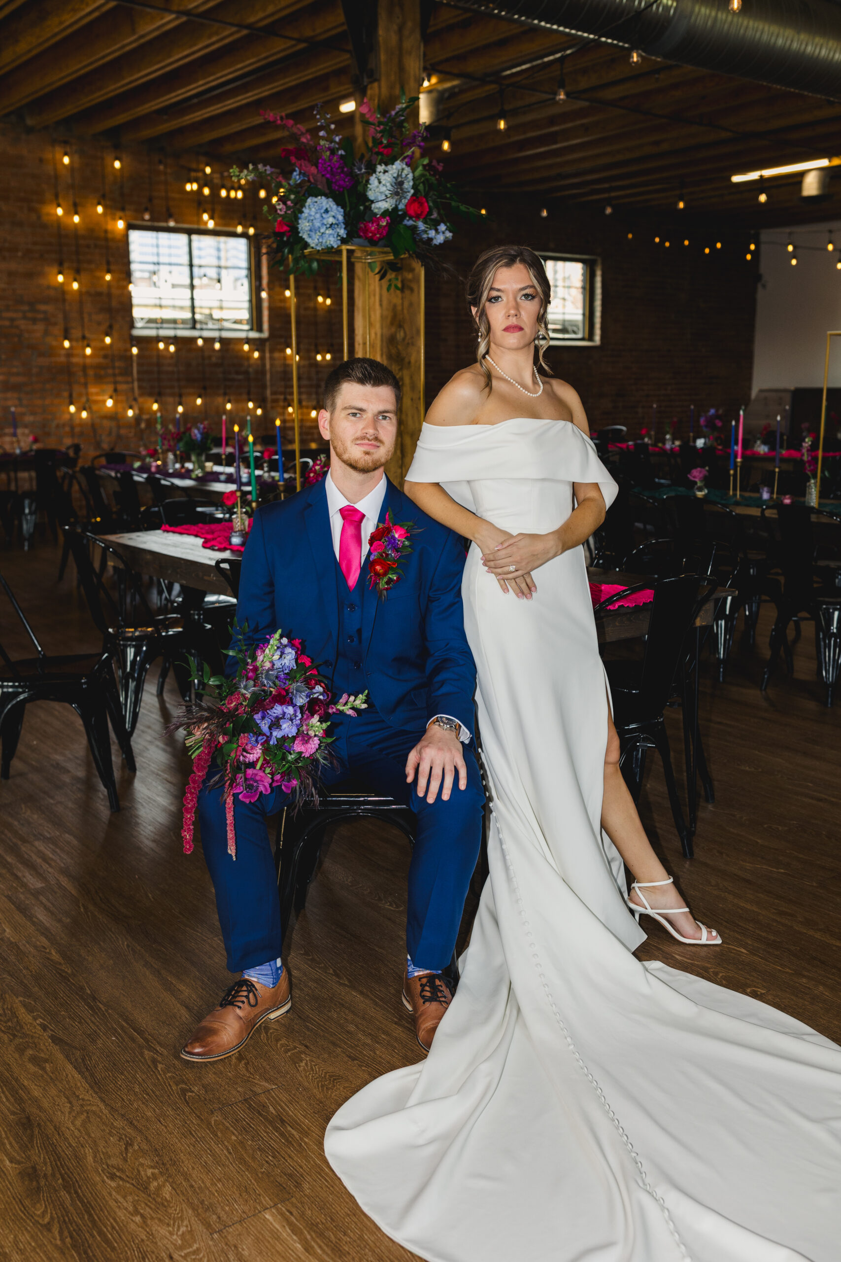 a couple taking their wedding portraits inside of union event venue in kansas city 