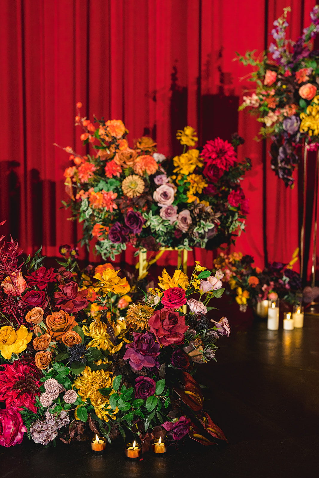 floral arrangements set up for a wedding inside of uptown theather in kansas city 