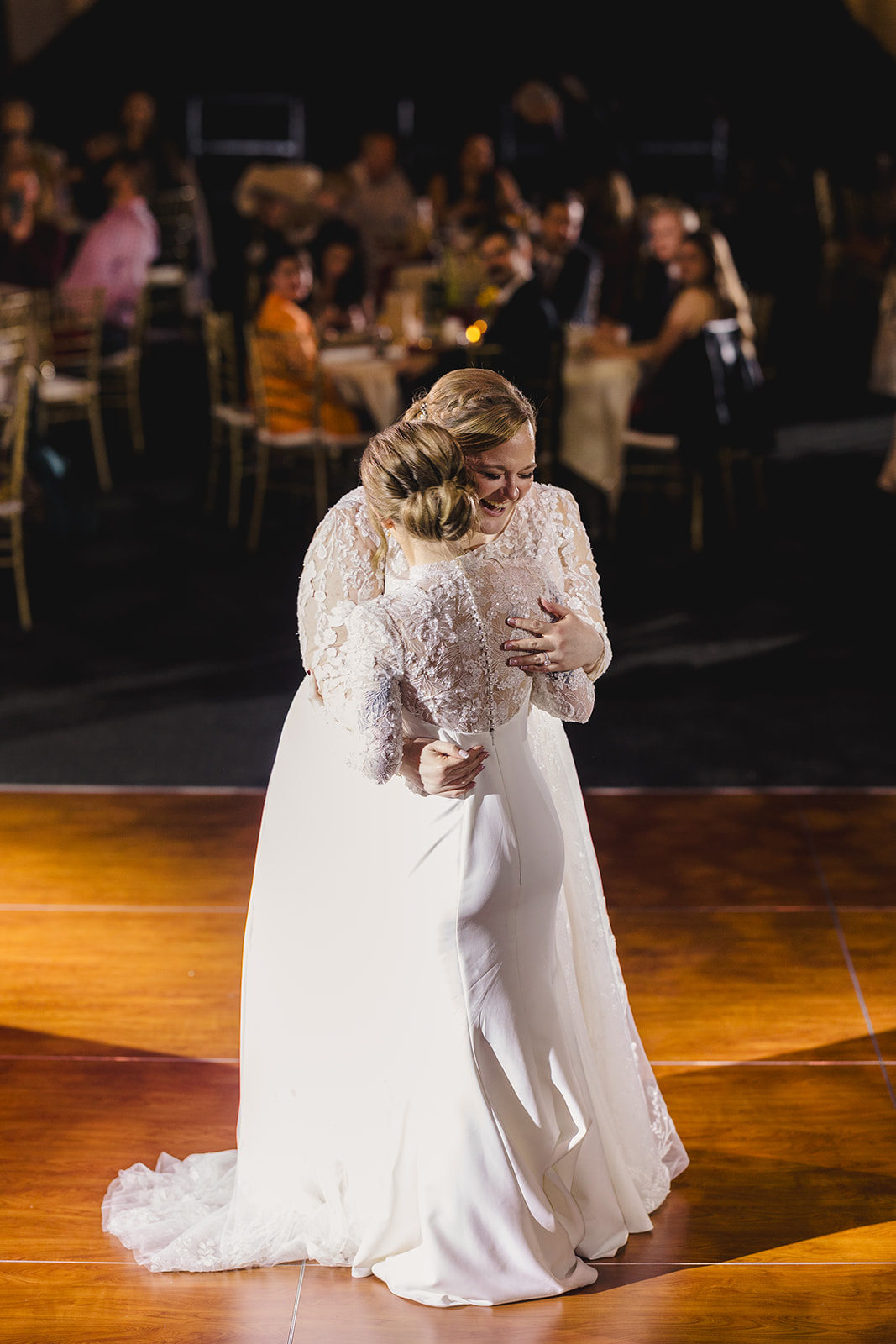 two brides sharing a first dance together 
