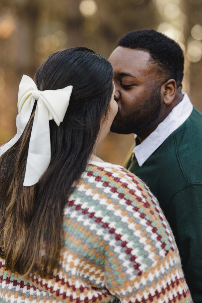 a couple kissing each other 