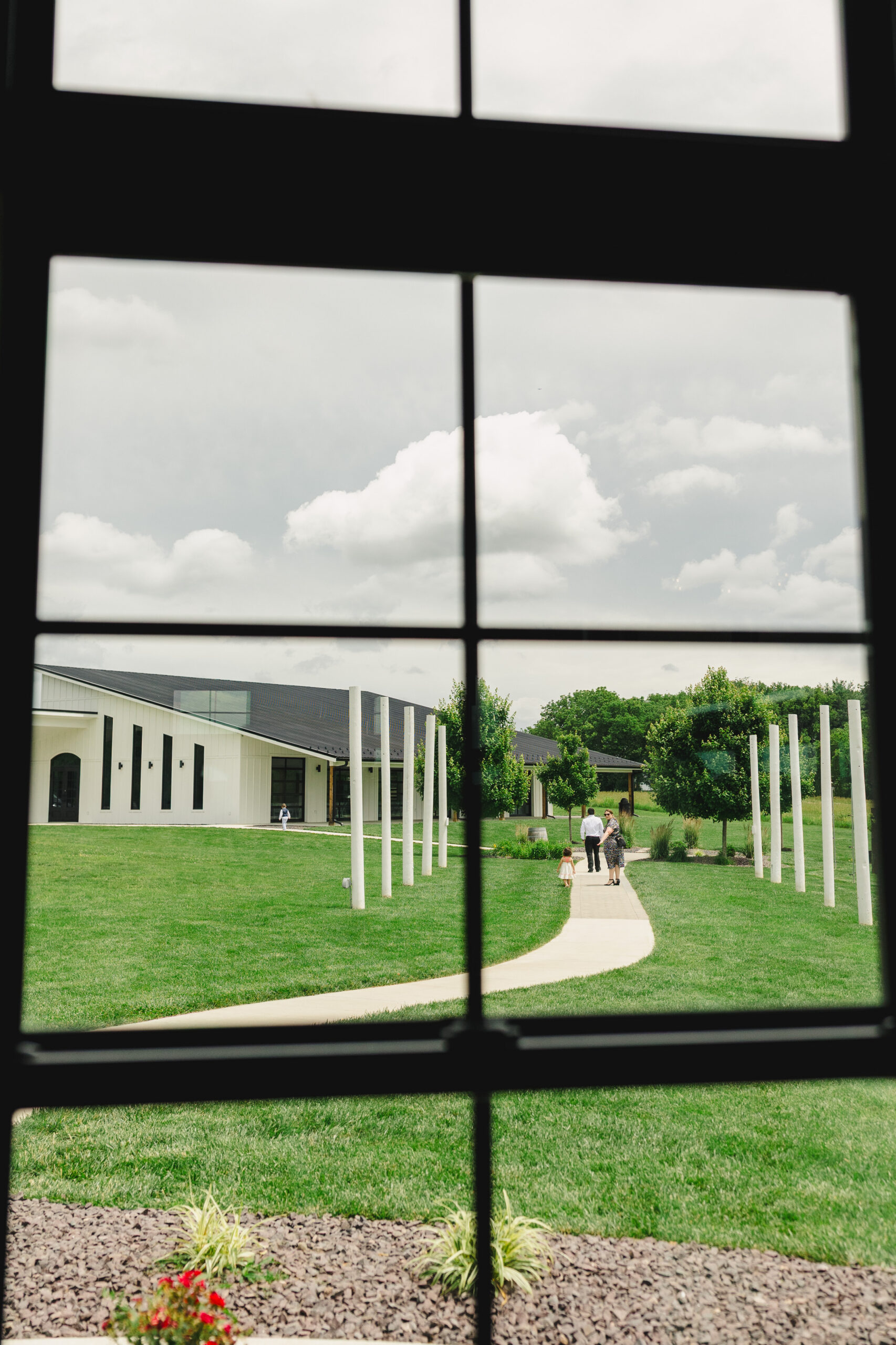 a view on the lawn of the brim in kansas city as seen through a window
