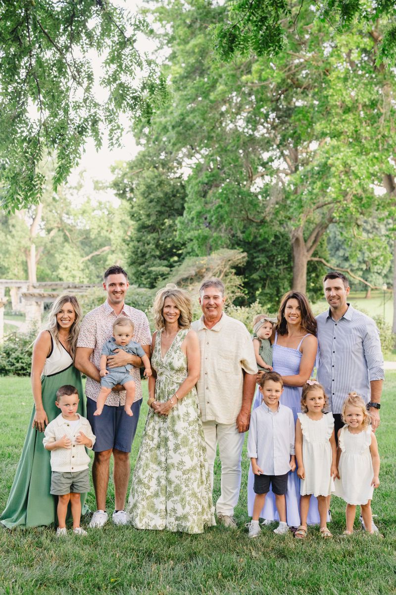 a family taking summer family photos in loose park 