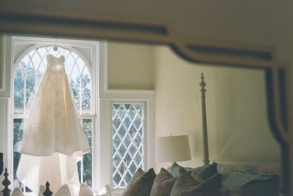 Dress hung up on the Peach room in Admiral's House in Charleston