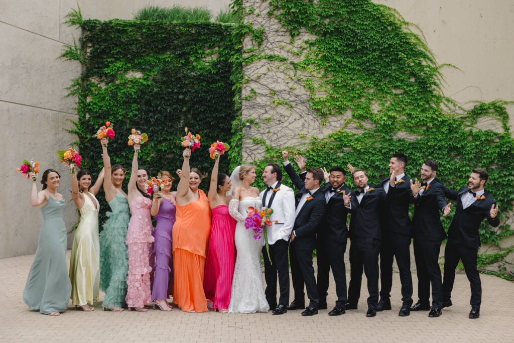 Bridesmaids in different color dresses Pavilion Event Space Kansas City