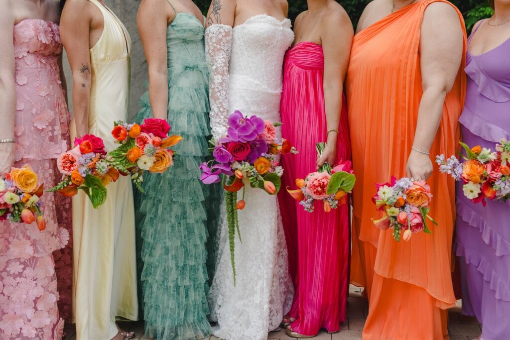 Bridesmaids in different color dresses Pavilion Event Space Kansas City