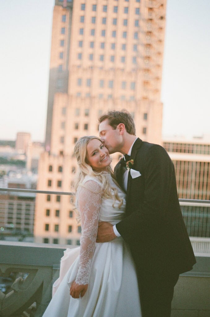 Kansas City skyline wedding photos at Hotel Kansas City Starlight Ballroom