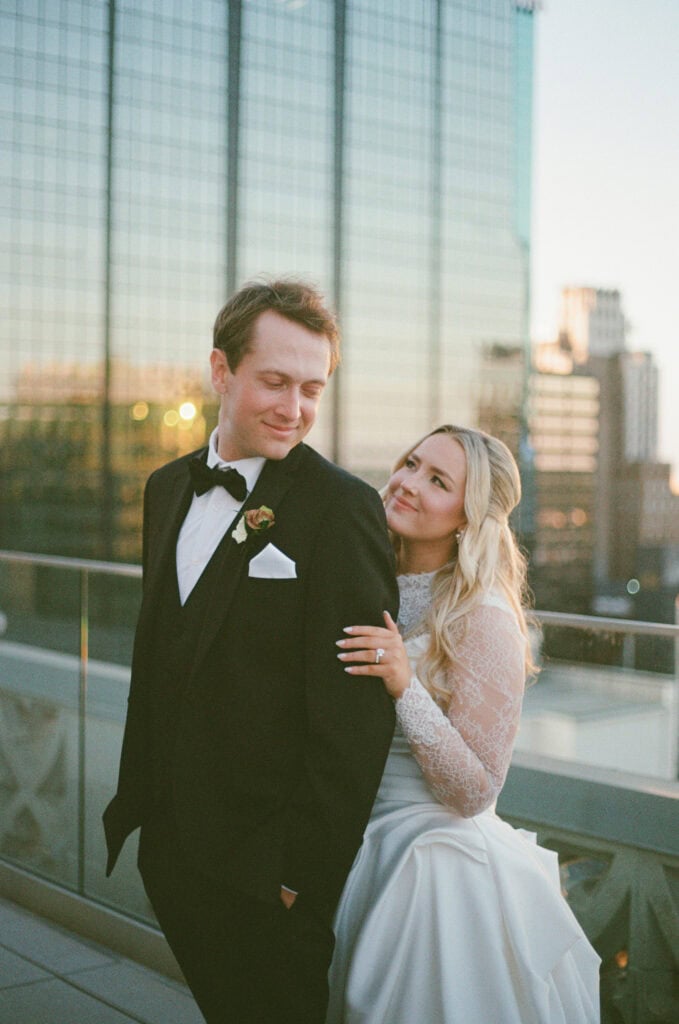 Golden hour wedding portraits Kansas City skyline Starlight Terrace