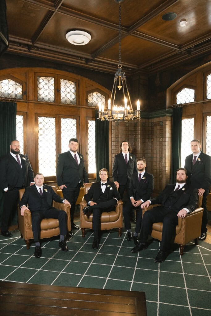 Groomsmen photos in the Grill Room at Hotel Kansas City