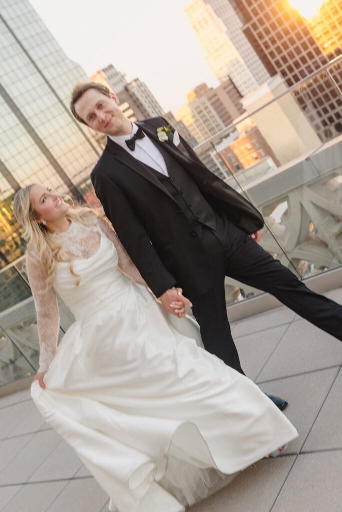 Golden hour wedding portraits Kansas City skyline Starlight Terrace